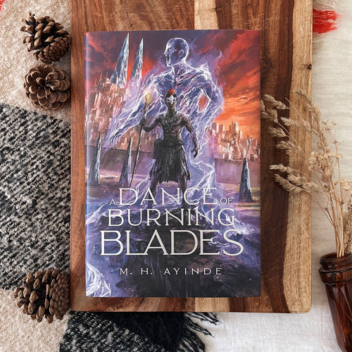A Dance of Burning Blades by M.H. Ayinde (lllumicrate Exclusive) cover image