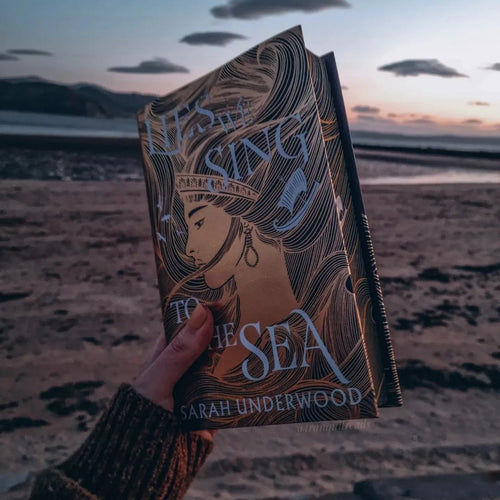 Lies We Sing to the Sea by Sarah Underwood (Illumicrate 'Live Like Legends' Exclusive) image